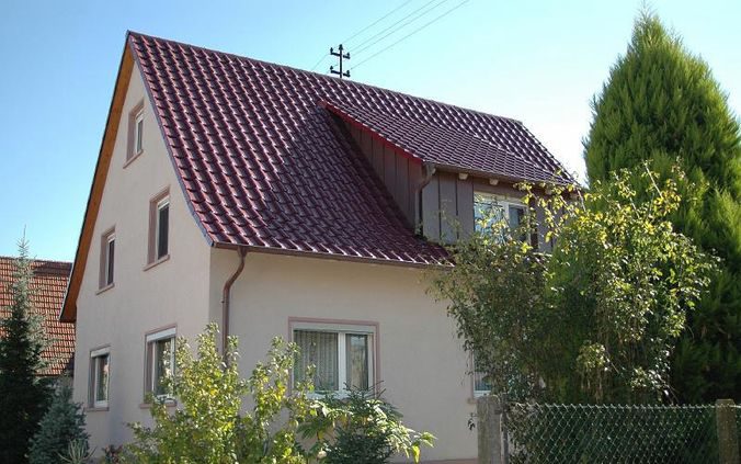 Дах з металочерепиці: характеристики і фото покрівлі