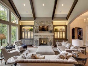 Інтер’єр вітальні з каміном в приватному будинку (72 фото): дизайн камінної зали в дерев’яному заміському будинку, установка каміна в центрі і інші варіанти