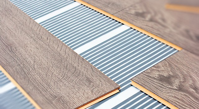 Теплый пол под ламинат: разбор лучших вариантов